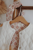 Veste matelassée sans manches crème/Indira Taille 36 mois