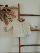 Veste matelassée avec manches enfant Crème/Bloom Taille 36 mois